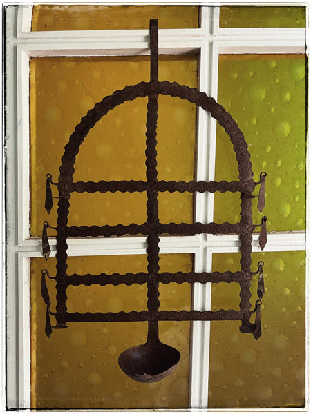 Antique iron toran