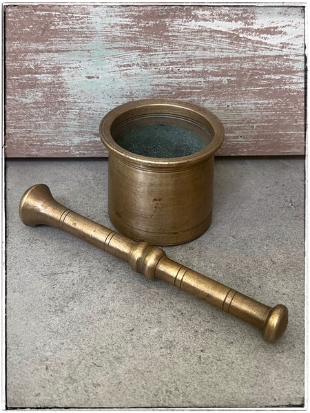Antique brass spice grinder