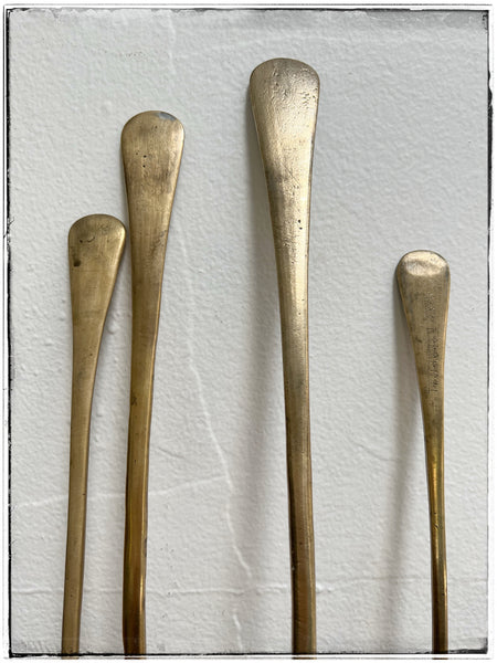 Antique brass spoons