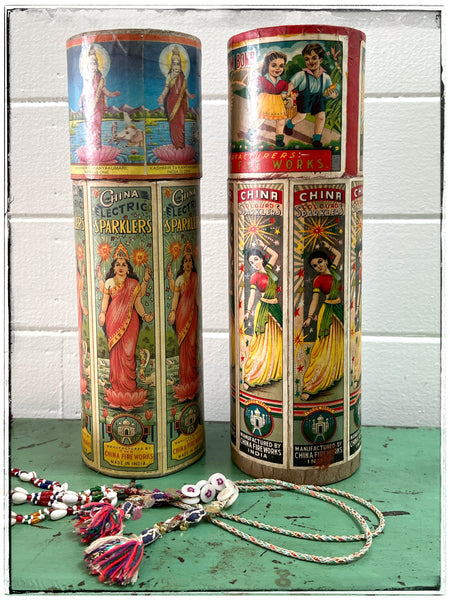 Vintage fireworks containers tall
