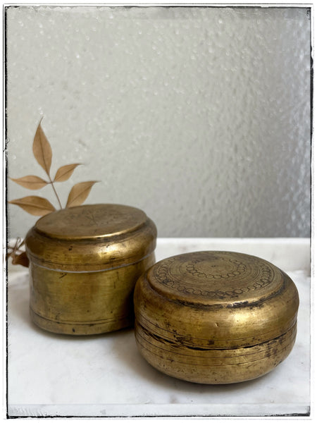 Vintage engraved tins