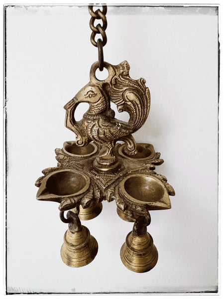 Antique hanging peacock diya