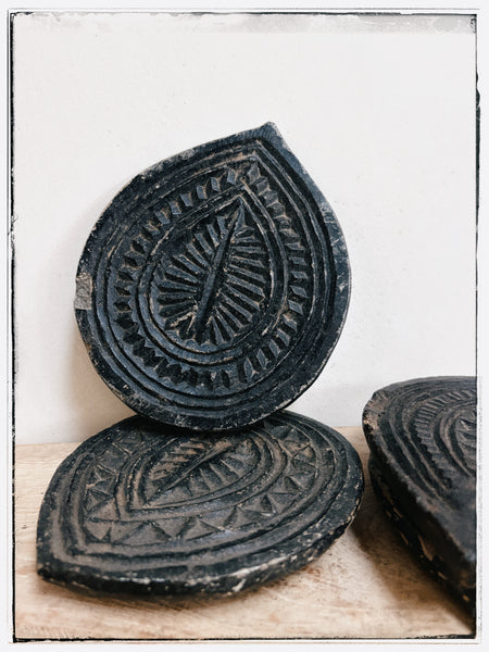 Antique carved stone plates