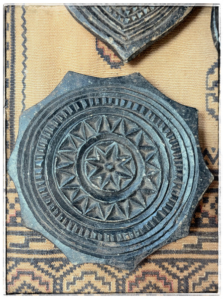 Antique carved stone plates