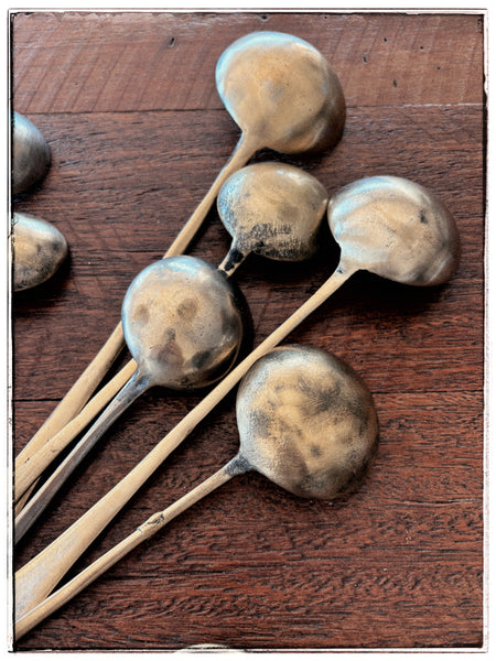 Vintage brass serving spoons