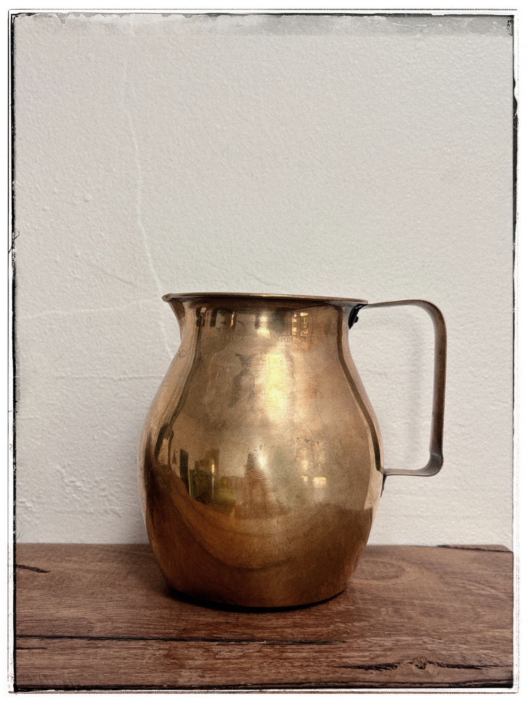 Antique brass water jug