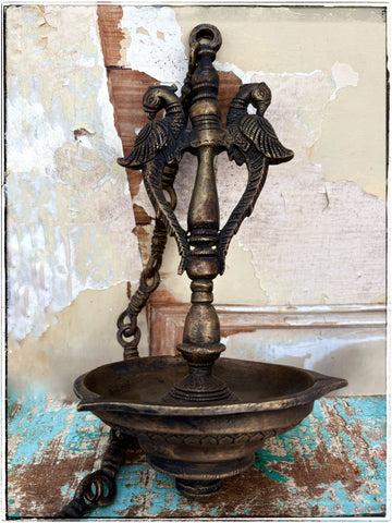 Antique hanging peacock diya