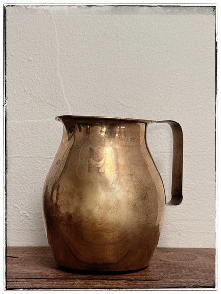 Antique brass water jug