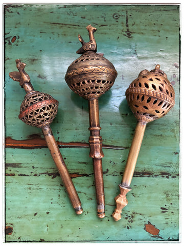 Antique brass rattles