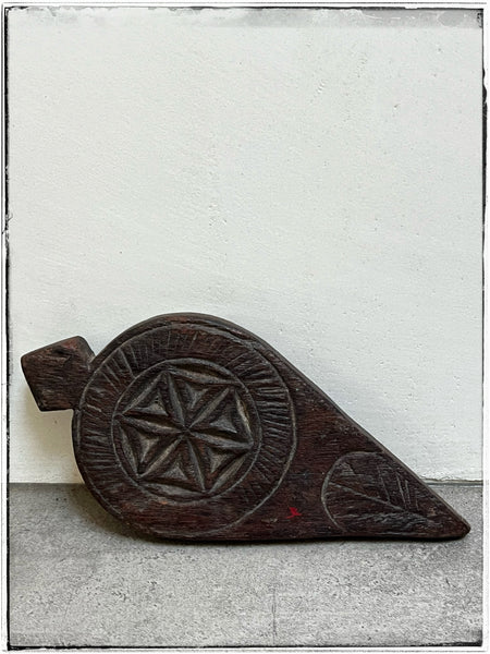 Carved wooden trivet