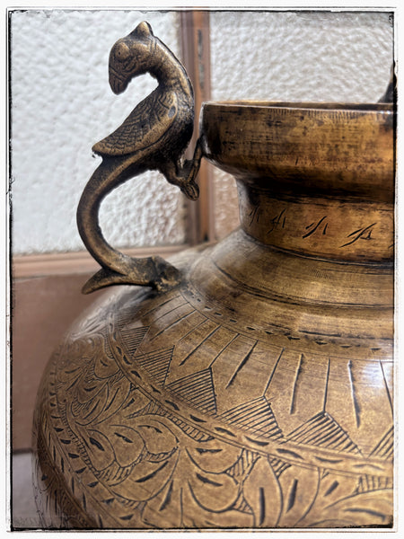 Large engraved brass urn