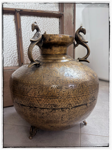 Large engraved brass urn
