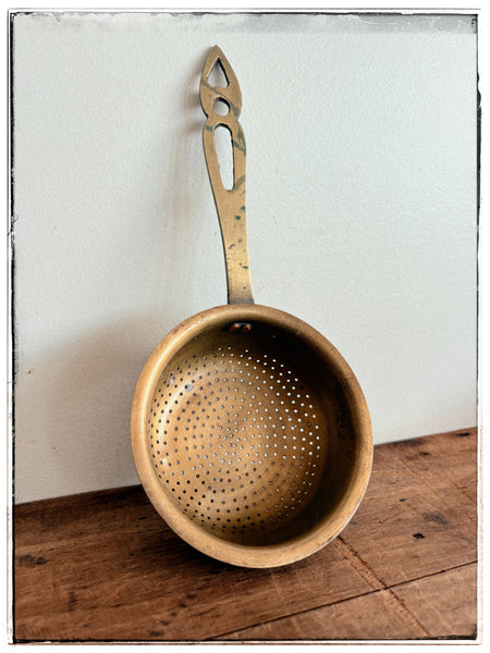 Vintage brass strainers