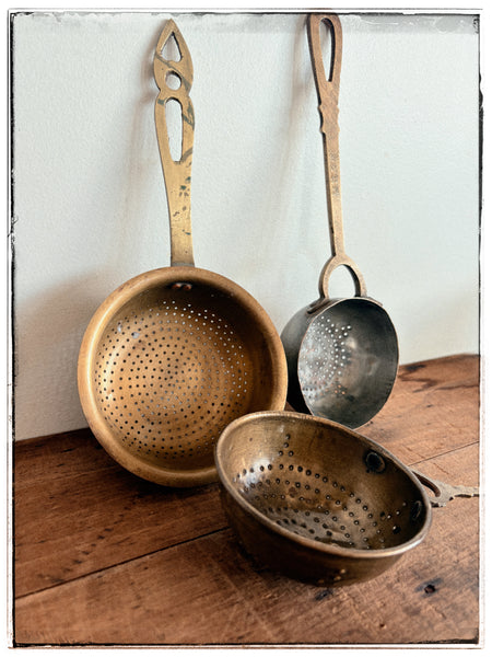 Vintage brass strainers
