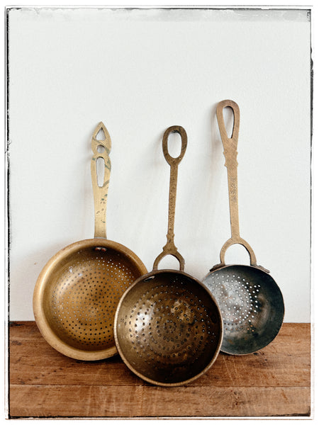 Vintage brass strainers