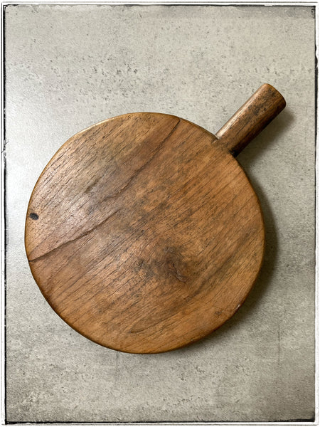 Old chapati board with handle