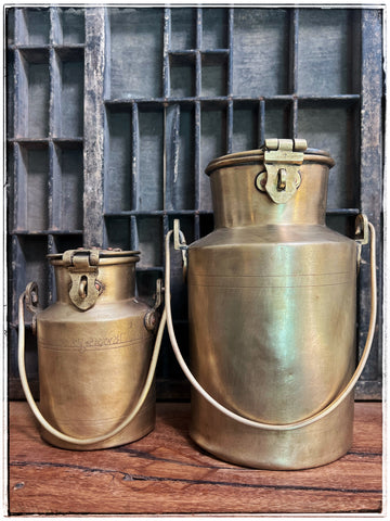Antique milk urns