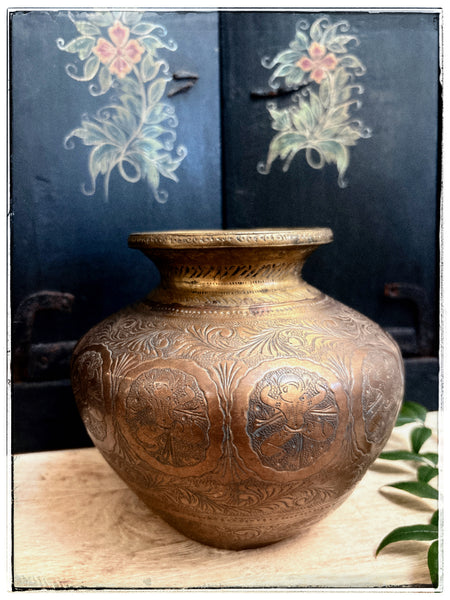 Antique engraved lotas