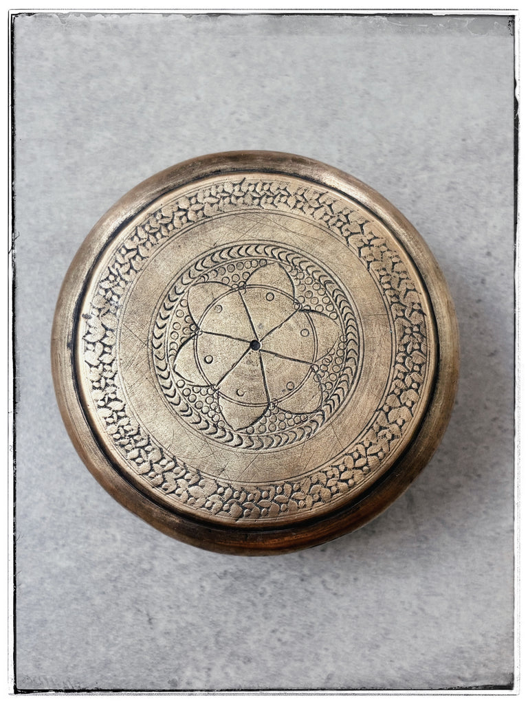 Antique embossed tin