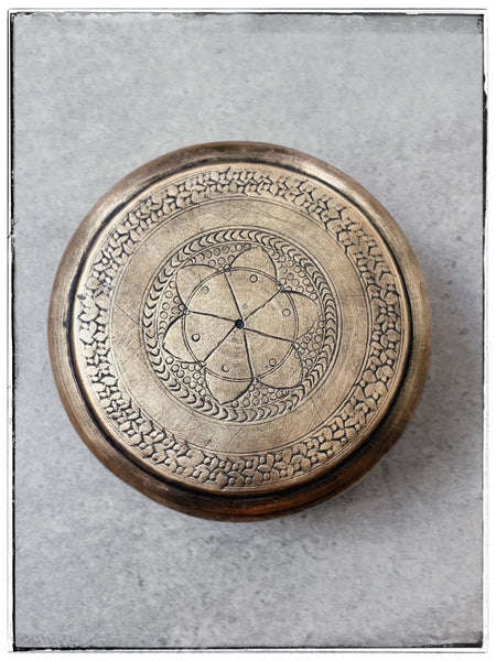Antique embossed tin
