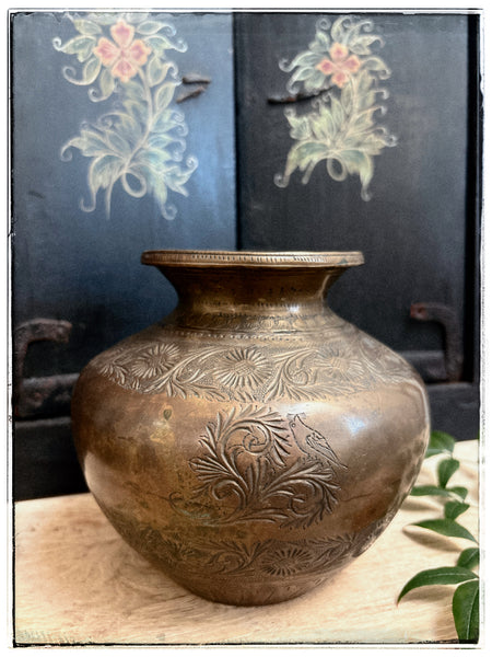 Antique engraved lotas