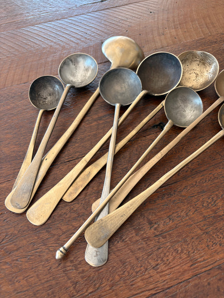 Vintage brass serving spoons