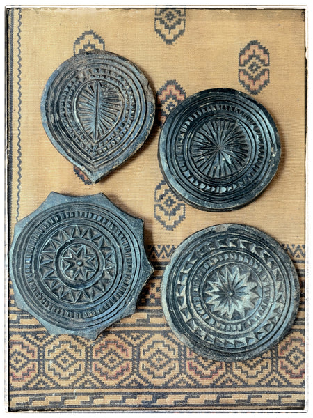 Antique carved stone plates