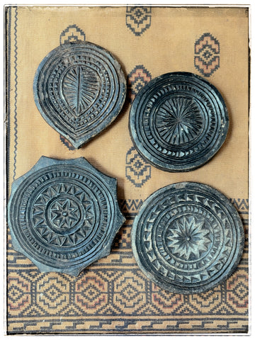 Antique carved stone plates