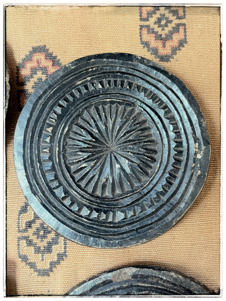 Antique carved stone plates