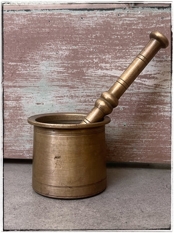 Antique brass spice grinder