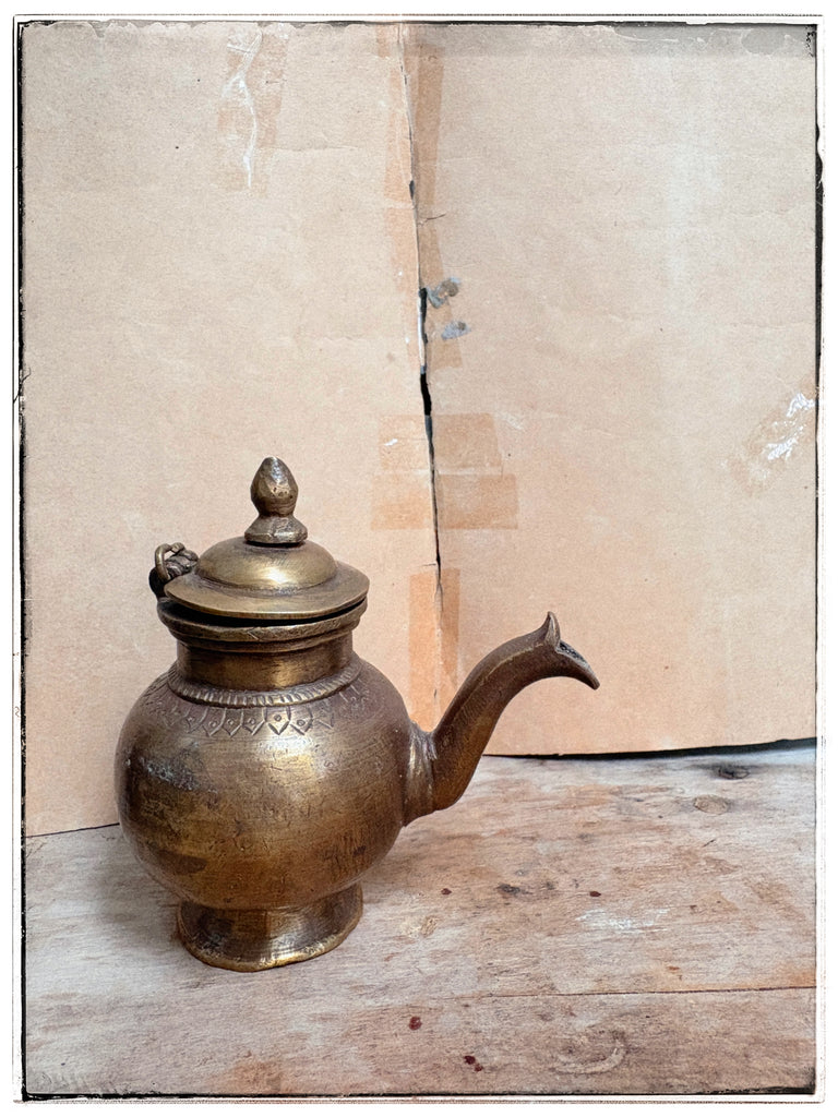 Antique puja oil jug