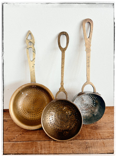 Vintage brass strainers