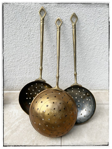 Vintage brass strainers