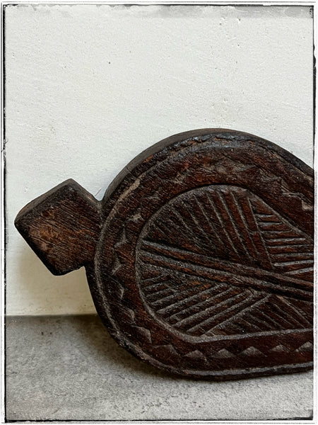 Carved wooden trivet