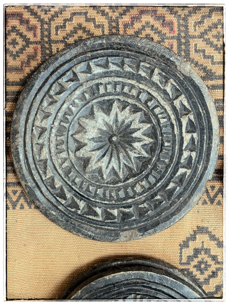 Antique carved stone plates