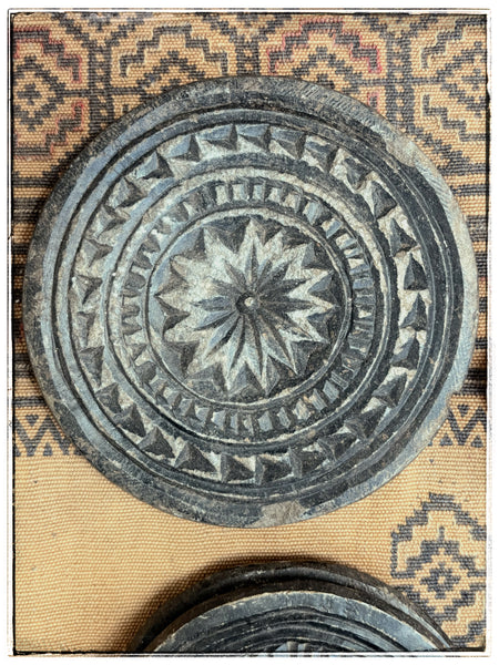 Antique carved stone plates