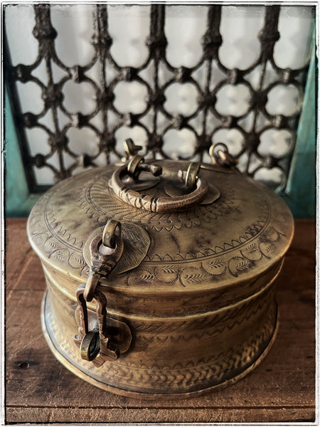 Antique brass box with chains