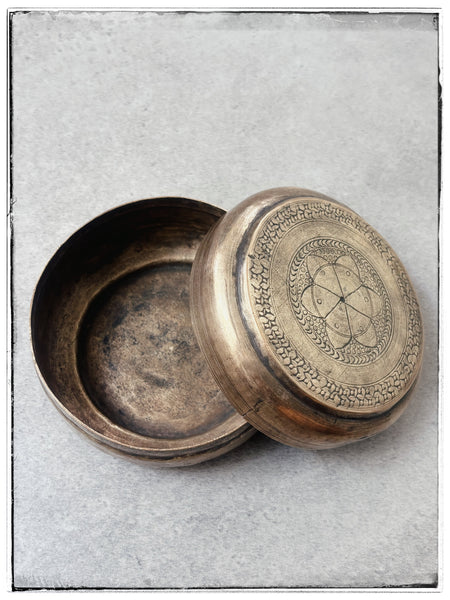 Antique embossed tin