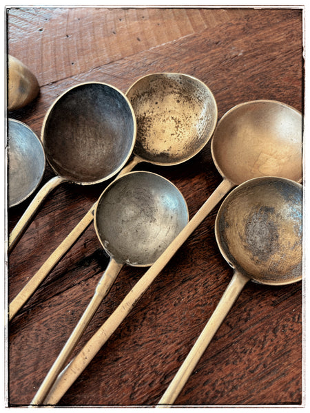Vintage brass serving spoons