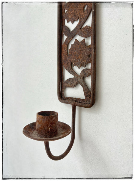 Cast iron candle holder
