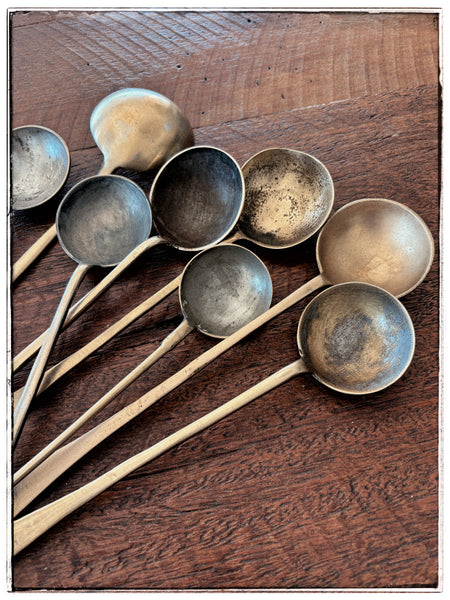 Vintage brass serving spoons