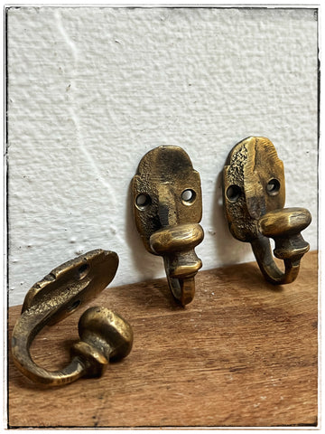 Vintage brass leaf/shield hook