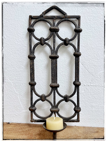 Cast iron candle holder