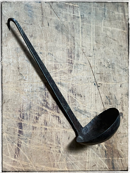 Vintage cast iron ladles