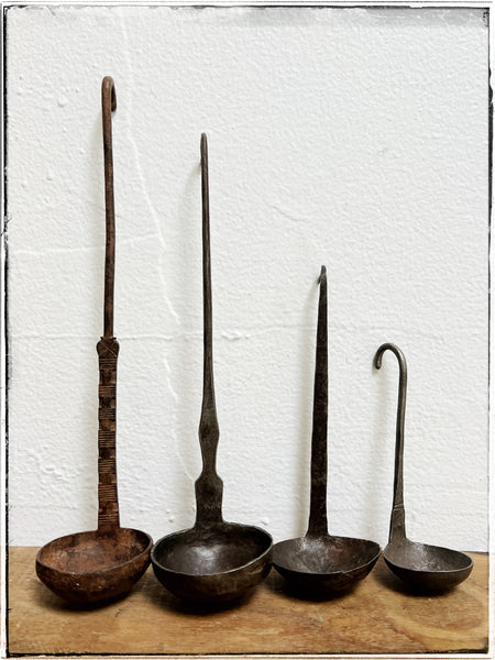 Vintage cast iron ladles