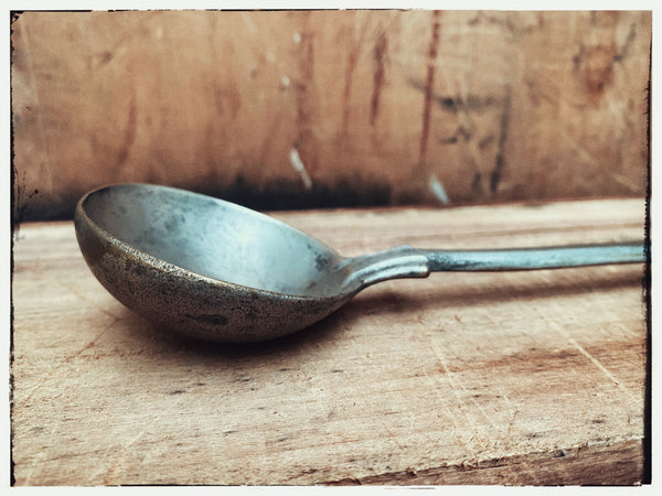 Vintage heavy brass spoon