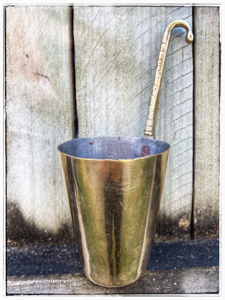 Hanging brass cup