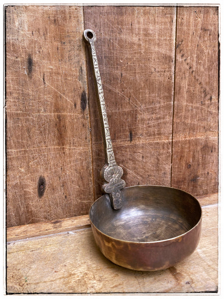 Antique bronze ladle