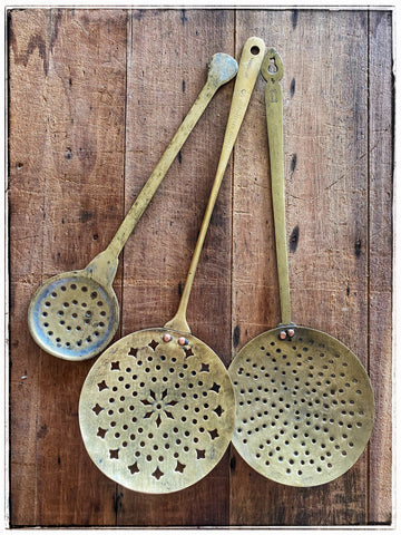 Vintage brass frying spoons